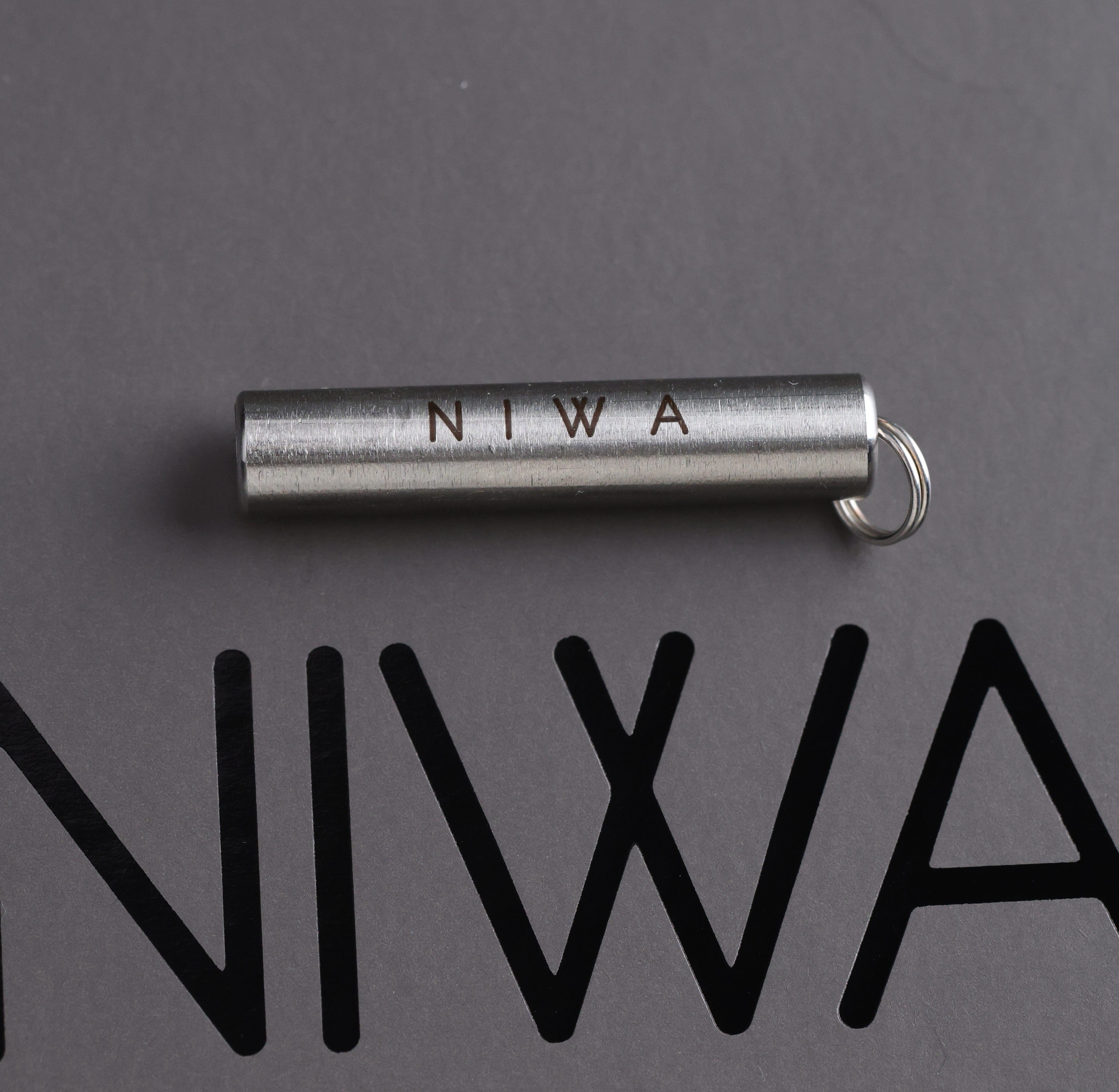 NIWA keychain magnet.