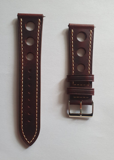 Strap. Brown leather band.